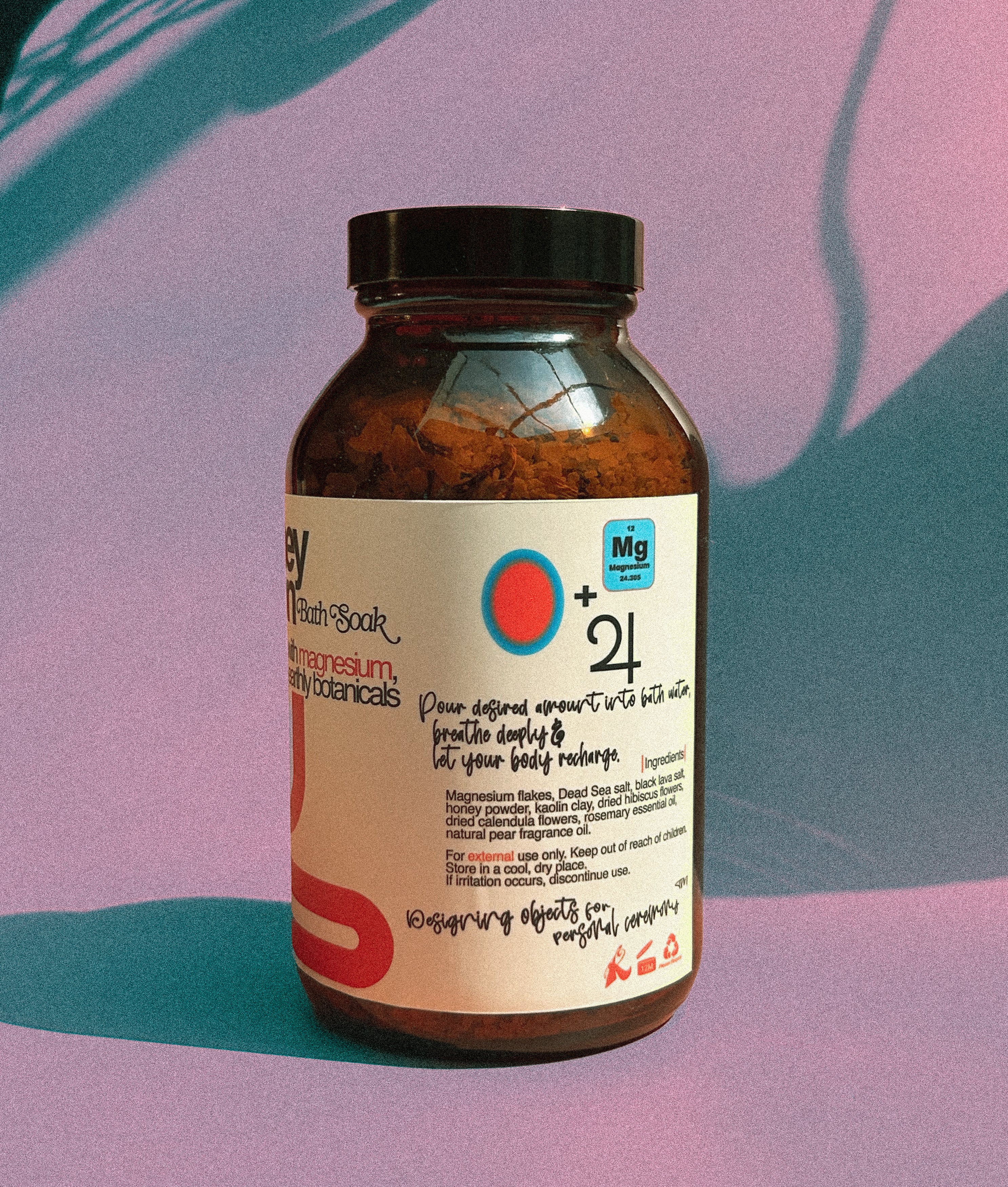 Honey Noon bottle with label on a gradient background